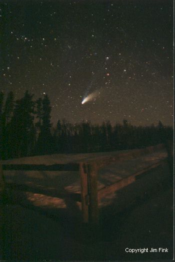 Comet Hale-Bopp Sets Over A Pasture Fence